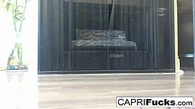 capri the brunette pornstar masturbates her pussy solo in high heels