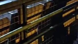 Two gay men embark on a wild outdoor fuck along the public road, their bodies entwined in raw passion.