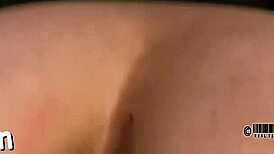 Caged cutie strips off glamorous attire in tight captivity