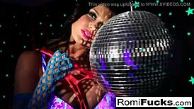 romi rain explores a disco ball and toys in a night club solo session