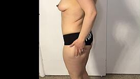 Hot milf rips clothes and fingers shaved wet pussy