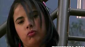 Tiny Tessa steps outdoors, strips naked, and begins teasing her petite latina body with fingering.