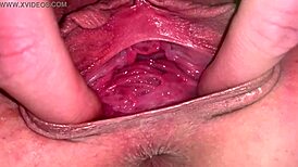 Feeling the intense stretch in her solo pussy gaping session