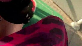 She gives a cute blowjob in public on the ferris wheel