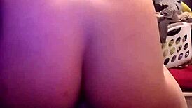 Excitedly Stretching to Insert Buttplug All the Way In