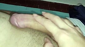 couple enjoys slow handjob session