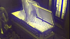 Twisted coffin fetish couple fucks hard in secret office cam footage.
