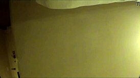 Camera Shy African Hair Dresser Relaxes And Struggles