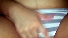 Latina amateur touches her shaved pussy