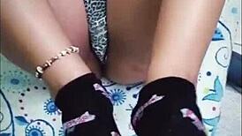 Beautiful slut gives footjob then gets fucked hard in bed!