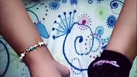 Beautiful slut gives footjob then gets fucked hard in bed!