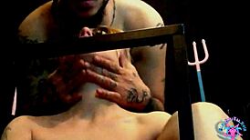 goth milf in cage sucking cock