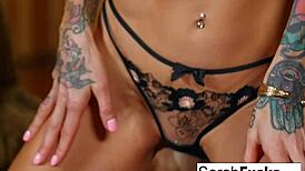 tattooed milf explores personal relaxation techniques in a private setting