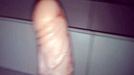 Transsexual shemale engages in public city masturbation outdoors