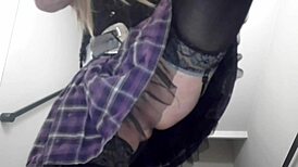 Transsexual shemale engages in public city masturbation outdoors