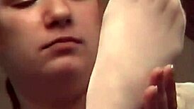 my sexy roommate slips on stockings for a footjob in the dorm