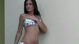 Hot Brunette Flashes Tits In Bikini During Provocative Photoshoot