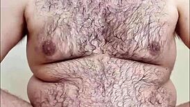 Curious gay chubby man reveals hairy body