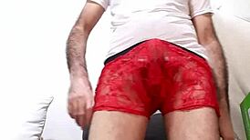 Big Dick Peeks Out of Red Transparent Lace Underwear