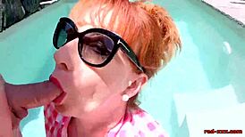 Red masturbates and sucks cock in pool