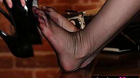 big boobed blonde posing on desk