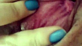 Tanned latina flaunting her natural tits and juicy pussy in a lively display.