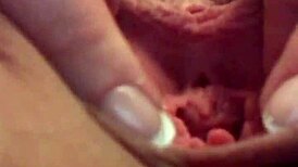 Puffy pussy hole stretched wide during intense solo masturbation session