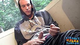 Naked homosexual thug smokes outdoors while masturbating his big hairy cock to cumshot