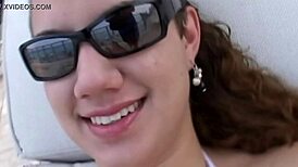 Amateur Young Woman Models Bikini at Beach Event