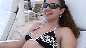 Amateur Young Woman Models Bikini at Beach Event