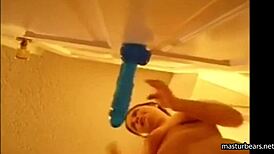 Alexis 19 fucks blue dildo mounted on door and squirts all over her pussy.