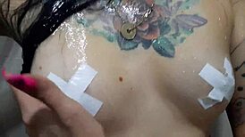 Dominatrix Nika Seduces with Tits in Shower