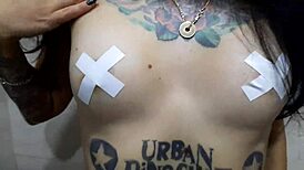 Dominatrix Nika Seduces with Tits in Shower