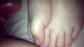 amateurs give footjobs in casual settings