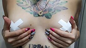 Dominatrix Nika Seduces with Tits in Shower