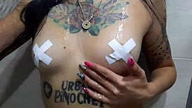 Dominatrix Nika Seduces with Tits in Shower