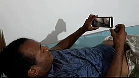 lying in bed watching ester tigresa videos touching herself but she comes to the room and gives it to him