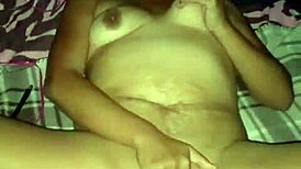 An Asian Milf Wife Engaging in Stretching Exercises at Home