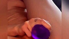 Closeup babe squirting from purple dildo?