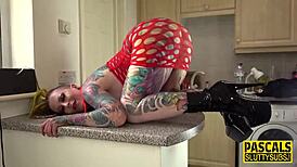 Tattooed Woman In BDSM Scene