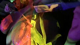 Discover busty Natasha's sexy solo masturbation under black lights