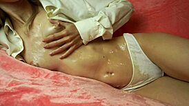 hot babe spills condensed milk on her body