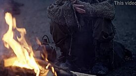 In this fantasy, baremaidens gather around the campfire