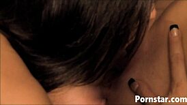 Brynn Tyler and Lexi Stone lick each other's shaved pussies on the sofa