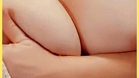 Milf wife reveals big tits under sheer jacket at home