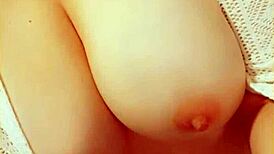 Milf wife reveals big tits under sheer jacket at home