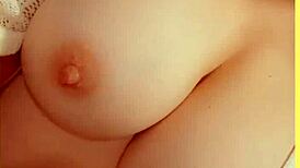 Milf wife reveals big tits under sheer jacket at home