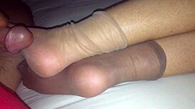 Nylon Socks Tease With A Sultry Footjob And Cumshot