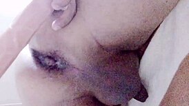 Mexican tranny drilling her asshole with a thick dildo