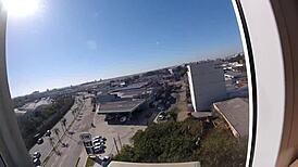 Naked Girl In Hotel Window Teasing Airport Viewers With Big Tits